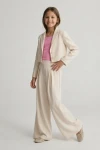 conjunto niña Emi beige claro vista trasera, espalda blazer niña, conjunto elegante espalda