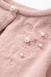bolero niña Ada rosa vista trasera, espalda bolero rosa, detalle ceremonia niña