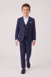 Traje Liam azul marino para niño en movimiento: americana, chaleco y pantalón