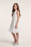 Vestido plisado Rozalia blanco de lado: corte trapecio hasta la rodilla