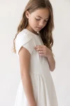 Vestido Rumi blanco de lado: manga tulipán y fruncido de la falda bajo la costura de la cintura
