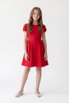 Vestido con mangas tulipán Rumi rojo para niña, cuerpo entero de frente