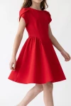 Vestido Rumi rojo: costuras curvas y fruncido lateral de la falda