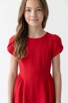 Vestido Rumi rojo, parte superior con mangas tulipán y cuello redondo, vista frontal