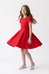 Vestido Rumi rojo girando con la falda de vuelo, cuerpo entero