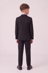 Traje Sam negro para niño de espaldas: americana y pantalón con raya