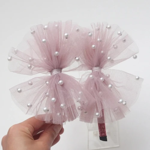 Diadema de tul rosa polvo