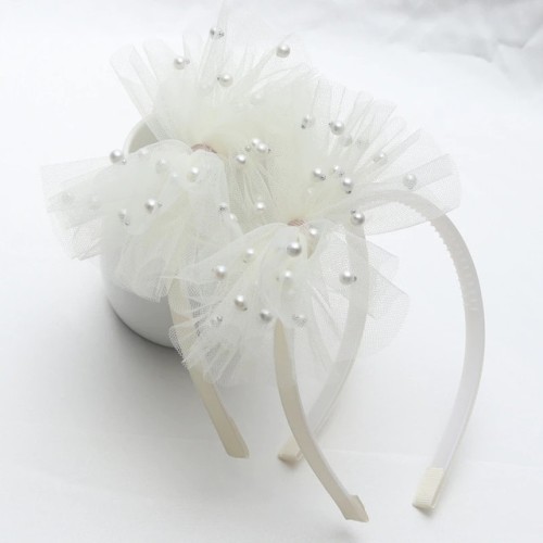 Diadema de tul crema